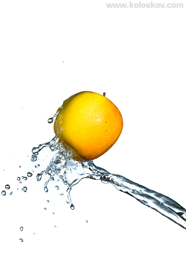 water-splash-stock-photo Water splash and yellow apple stock photo